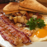 Bacon-and-egg platters are popular at Bella's Breakfast and Lunch