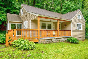 Exterior view of nice rental cottage with fenced yard in NC mountains