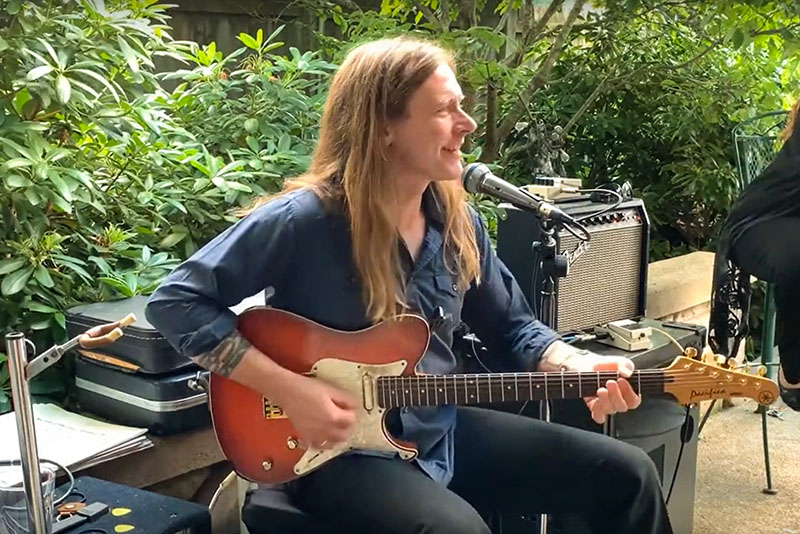 Adam Musick plays guitar and sings at Banner Elk Cafe