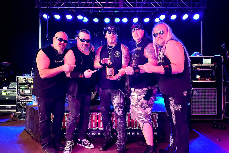 Throwdown Jones band poses on stage