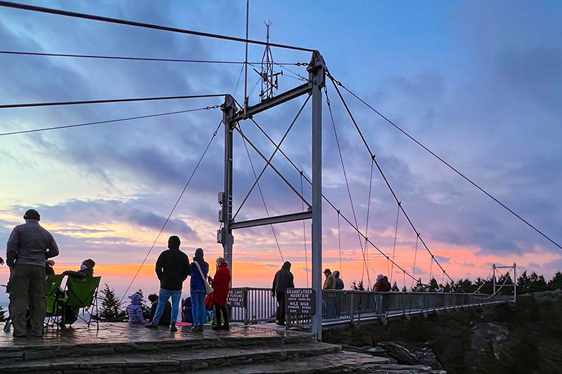 People enjoy a New Year's Day Sunrise at Grandfather Mountain near Banner Elk NC