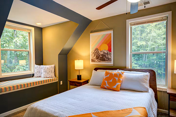 Queen bedroom with artsy decor in Banner Elk