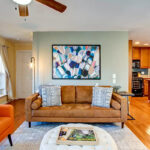 This vacation home features a light, open living area with vibrant colors