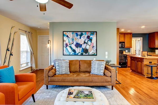 This vacation home features a light, open living area with vibrant colors