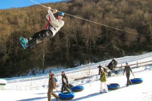 Hawksnest Resort offers snow tubing and ziplines in NC