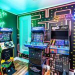 Retro '80s arcade room in Klonteska Lodge includes Ms. Pac-Man