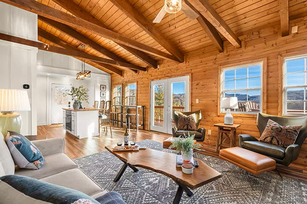 Light, open living areas of this vacation rental overlook Banner Elk, NC