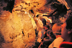 Visitors take a guided tour of Linville Caverns in the NC mountains