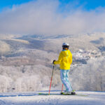 Blue sky skiing day in NC at Sugar Mtn Resort near Boone.