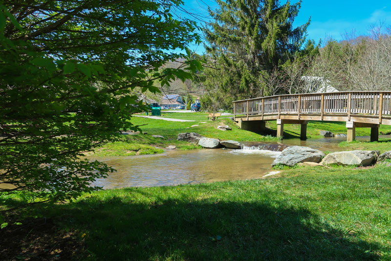 Bridge and small waterfall at Tate-Evans Park Banner Elk NC