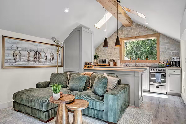 Modern living area and kitchen of Penthouse vacation rental Banner Elk