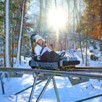 A winter ride with snow on the ground at Wilderness Run Alpine Coaster in Banner Elk, NC