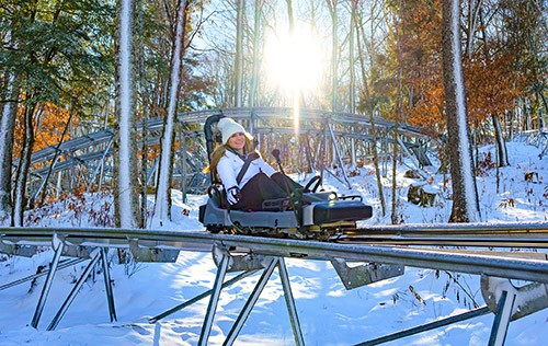 A winter ride with snow on the ground at Wilderness Run Alpine Coaster in Banner Elk, NC