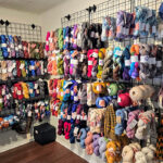 Robust selection of alpaca yarns adorn the racks at Apple Hill Outpost